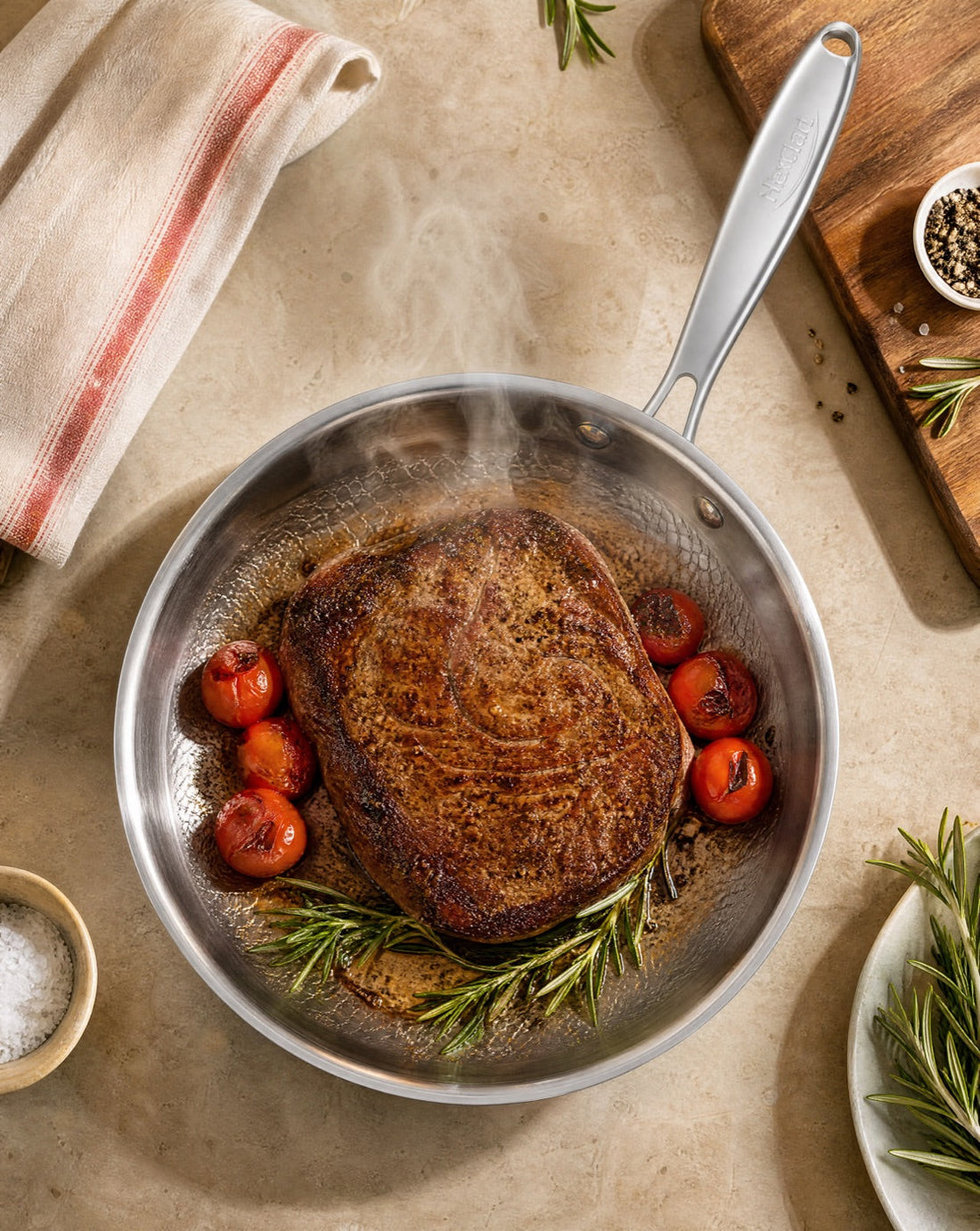 Steak searing in a titanium frying pan